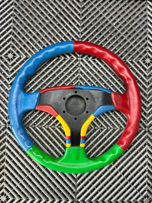 Used. MOMO Benetton Harlequin D&W steering wheel