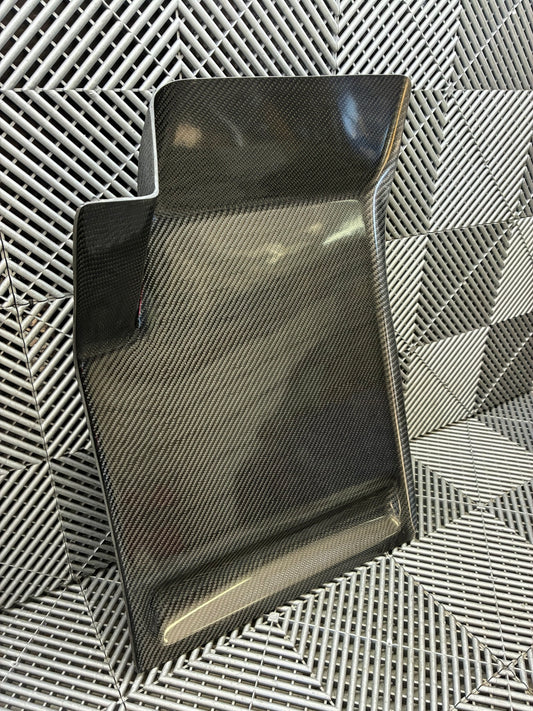 New. Carbon fiber driver side foot rest plate