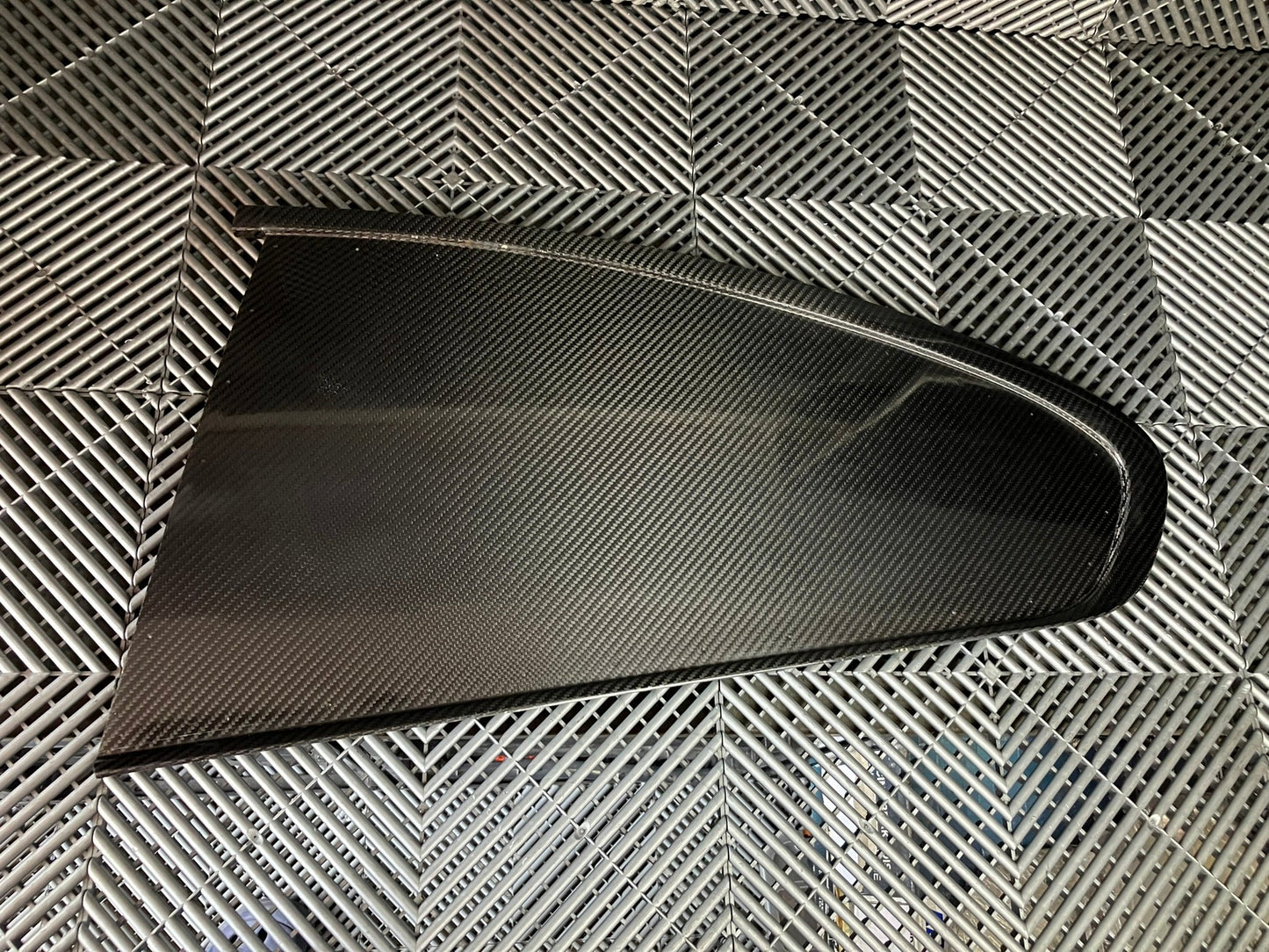 Used. Rear left side dry carbon window cover for Bmw E92.