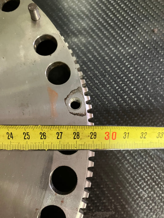 Used. Ford Cosworth lightweight flywheel.