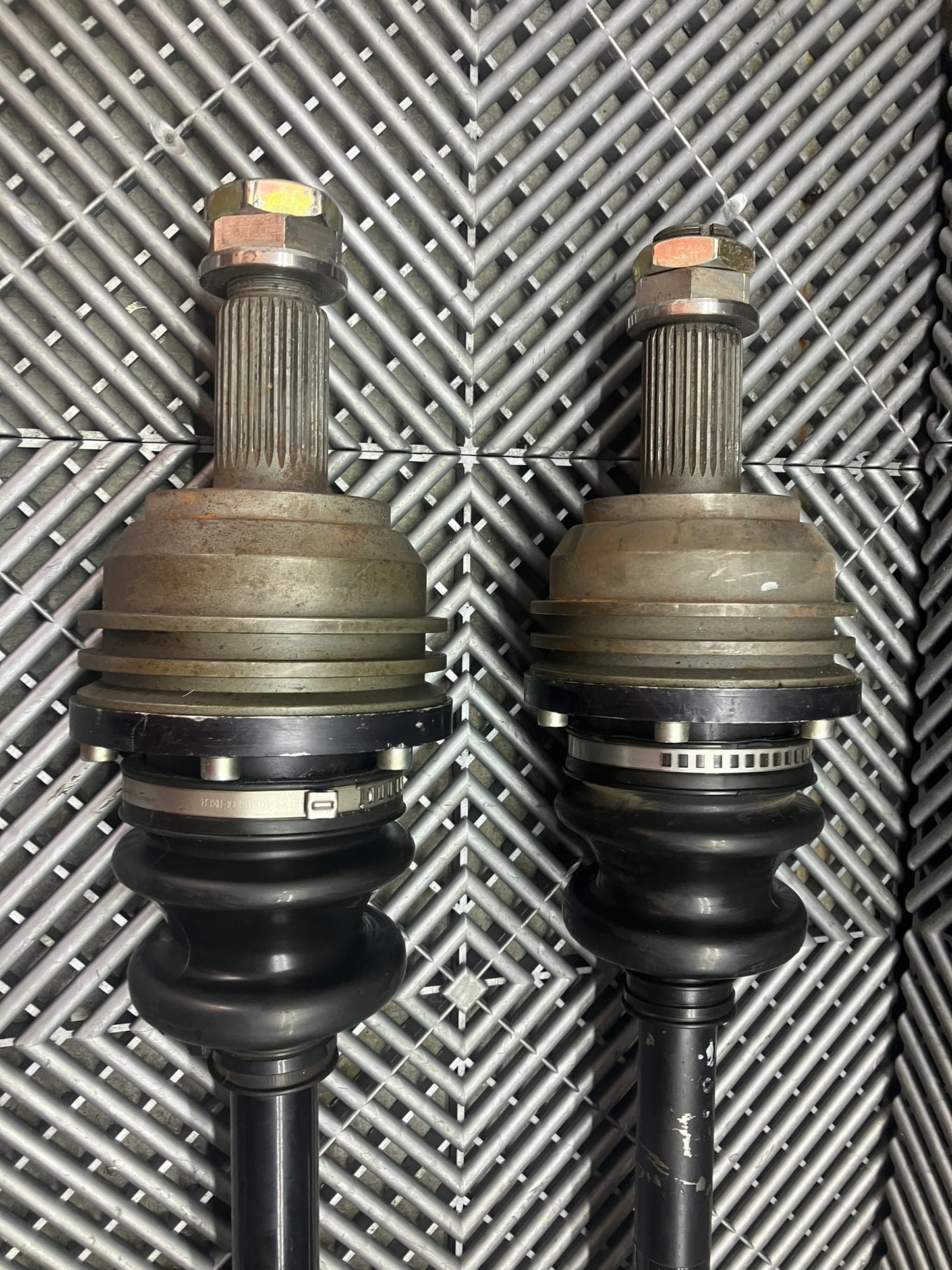 Used. BMW M3 E9X equal length longer axles with ventilation inserts