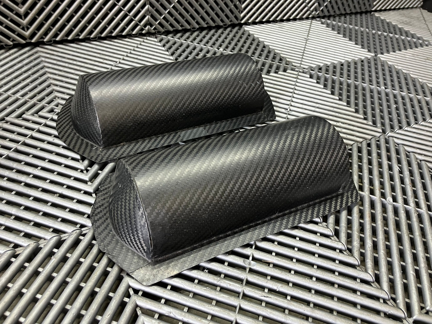New. Set of 2 Carbon fiber covers.