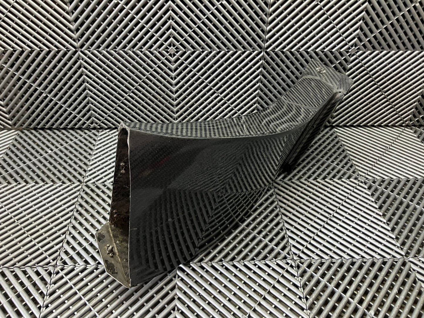 Used. Set of front bumper/diffuser air ducts. Carbon fiber