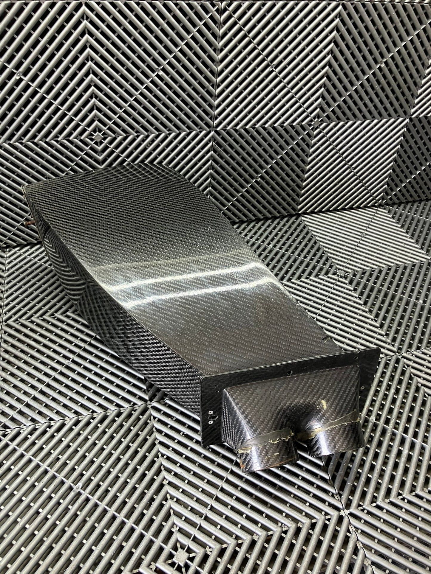 Used. Set of front bumper/diffuser air ducts. Carbon fiber