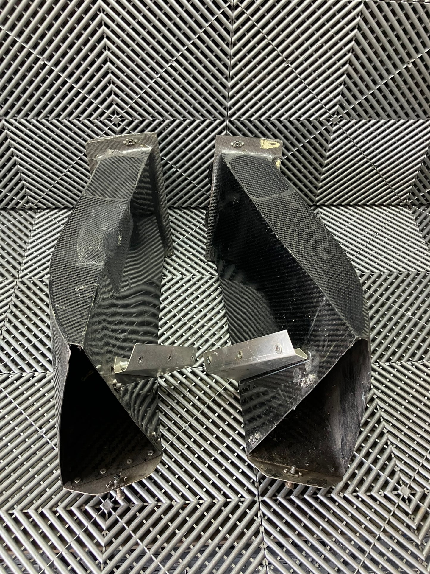 Used. Set of front bumper/diffuser air ducts. Carbon fiber