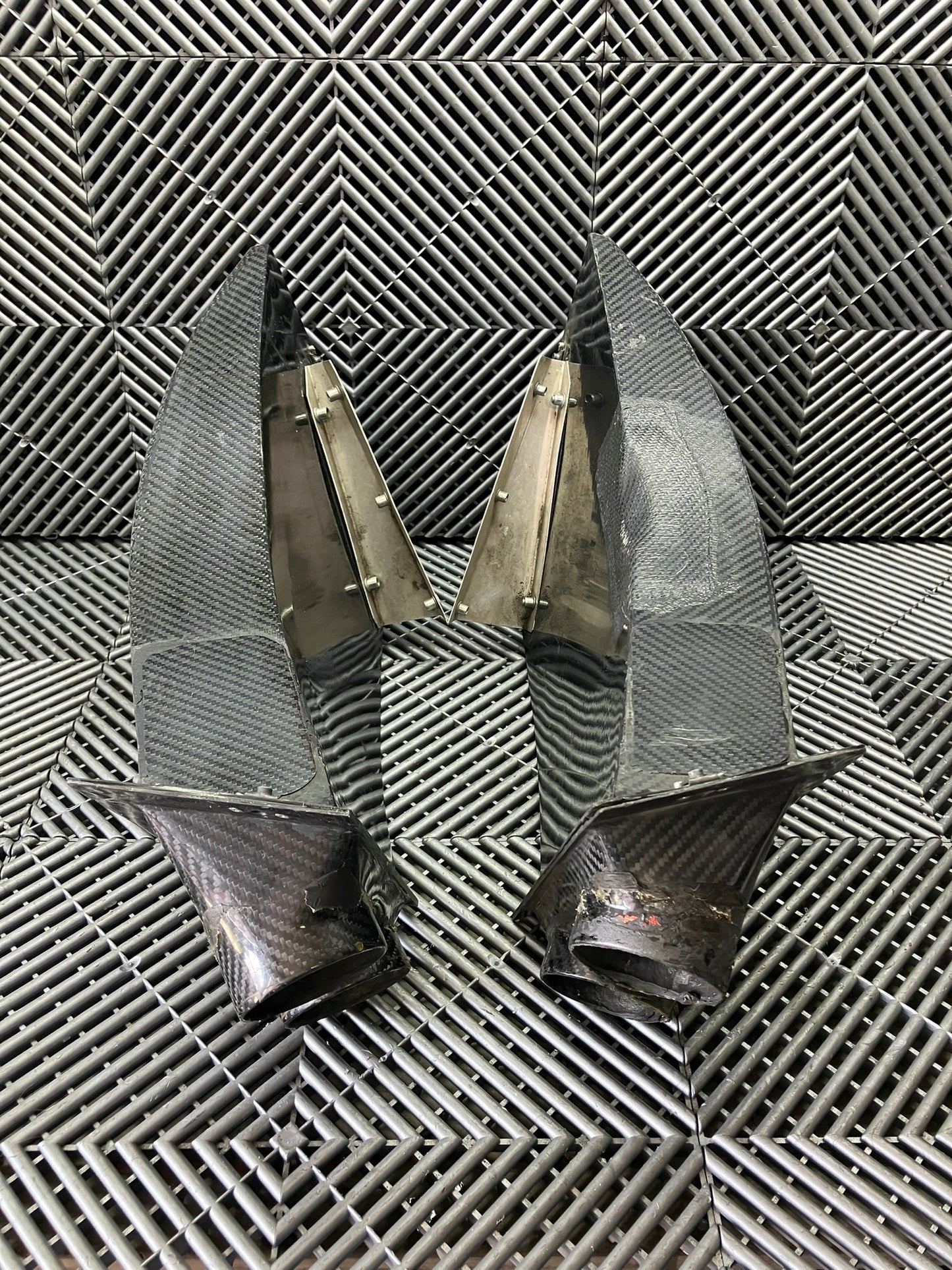 Used. Set of front bumper/diffuser air ducts. Carbon fiber