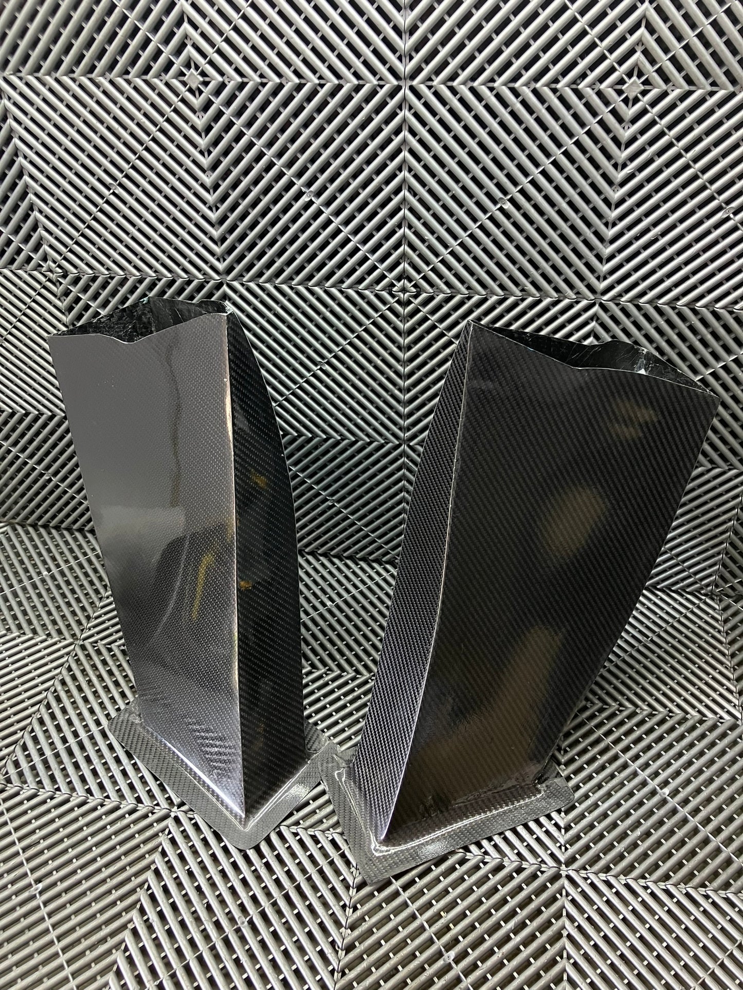 New. Set of front bumper/diffuser air ducts. Carbon fiber
