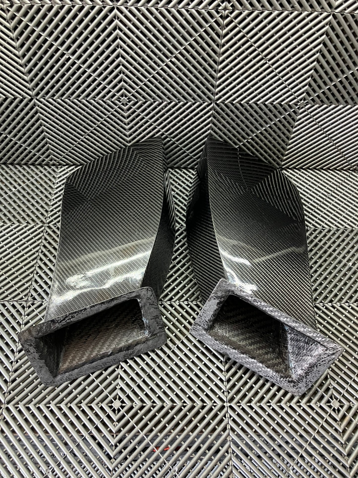 New. Set of front bumper/diffuser air ducts. Carbon fiber