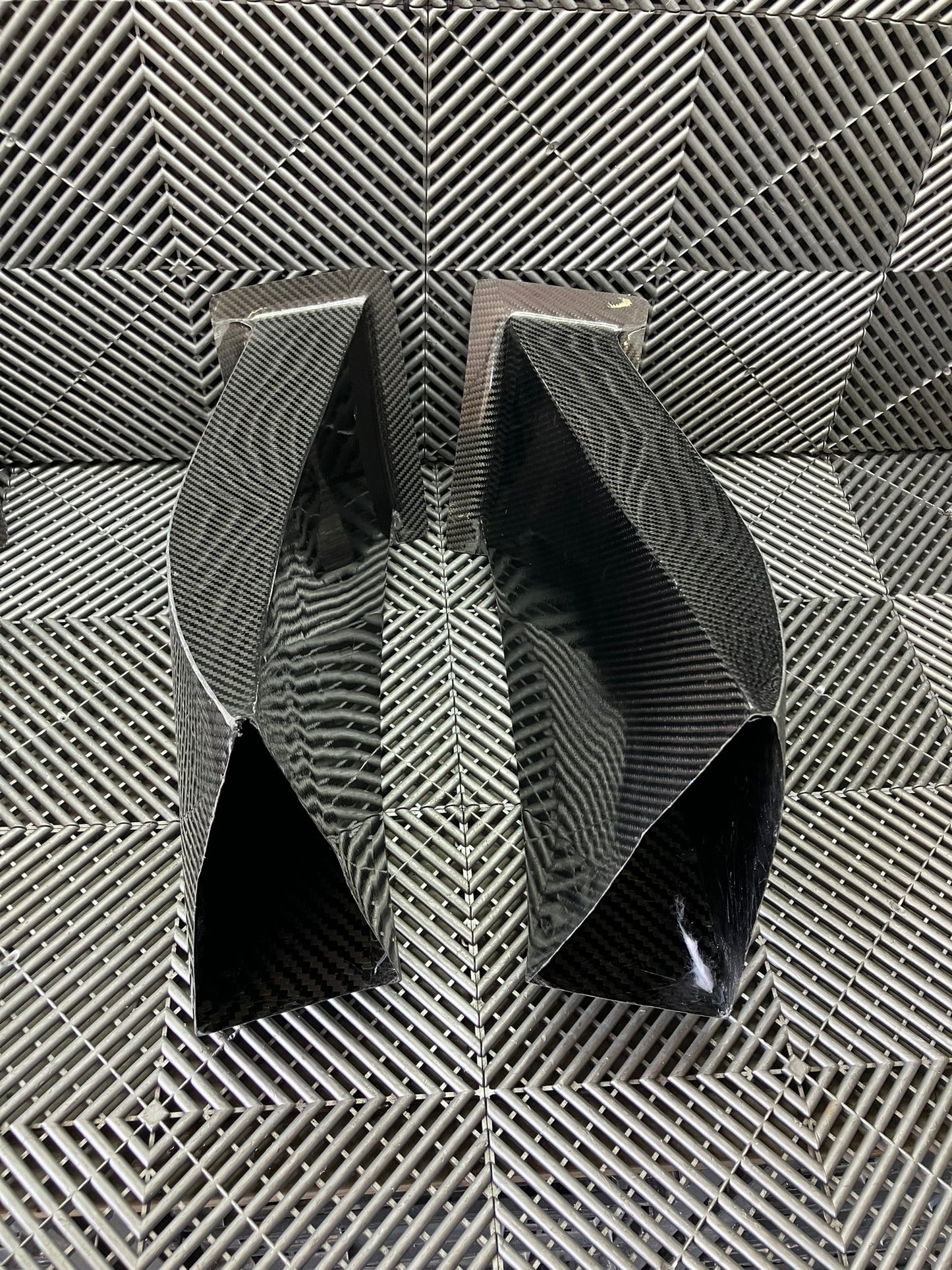 New. Set of front bumper/diffuser air ducts. Carbon fiber