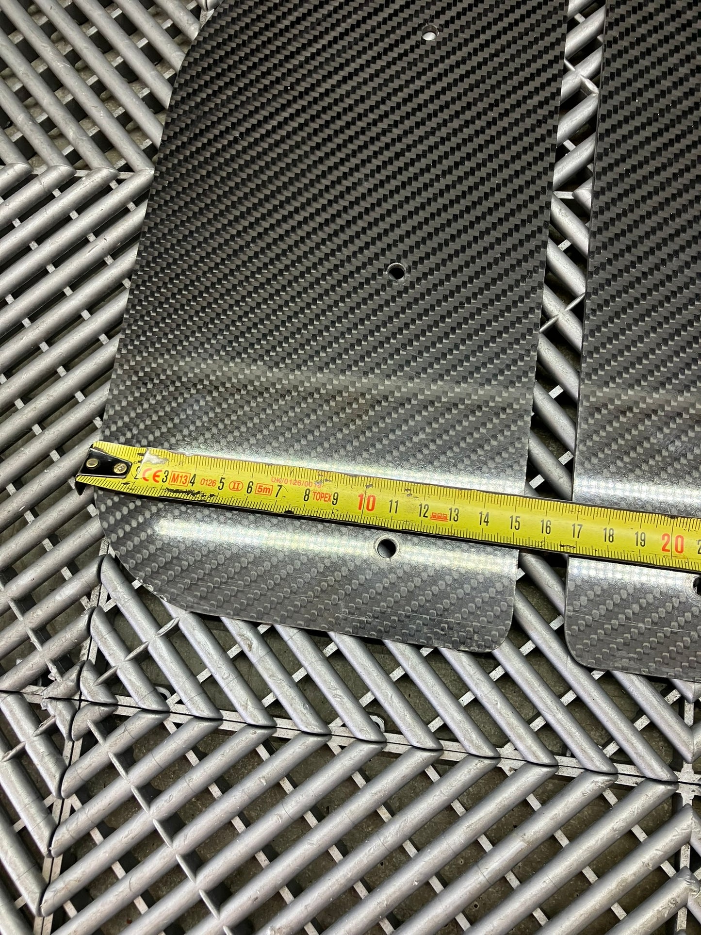 Used. Spoiler end plates. Carbon fiber