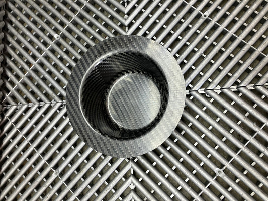 New. Air jack connecting valve mounting bracket. Carbon fiber.