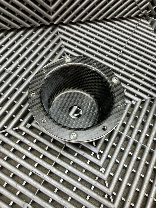 Used. Air jack connecting valve mounting bracket. Carbon fiber.