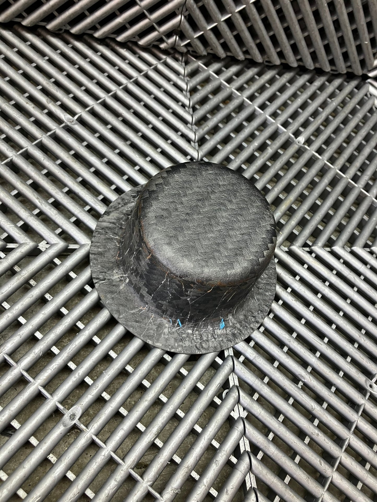New. Air jack connecting valve mounting bracket. Carbon fiber.