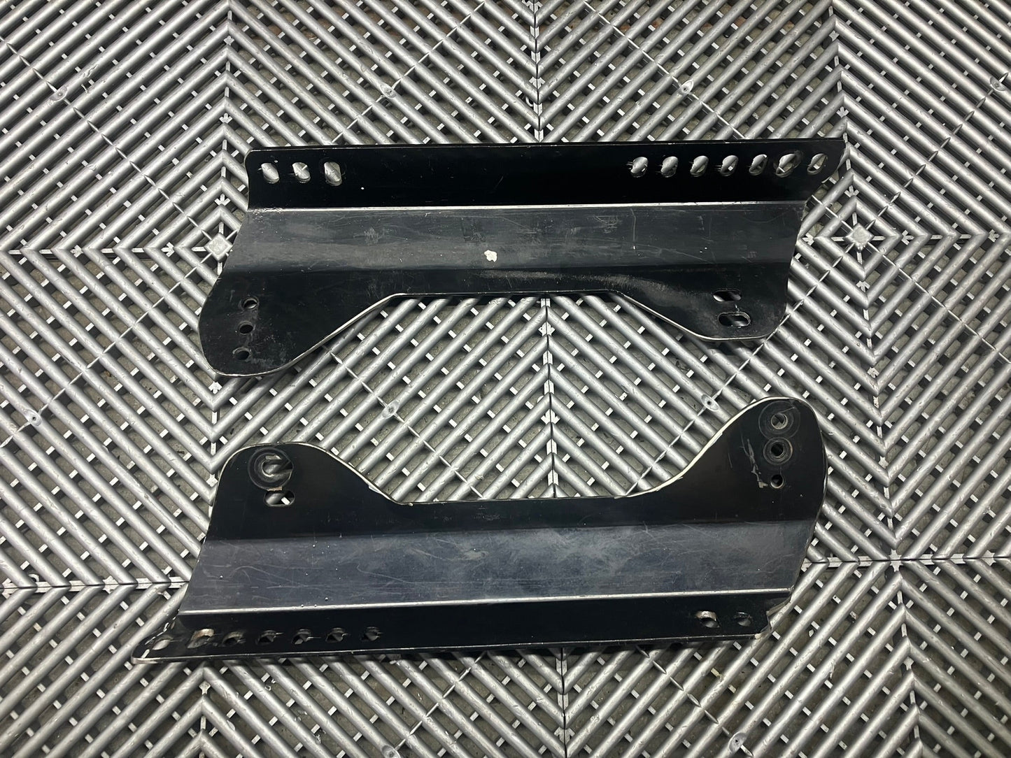 Used. Universal race seat side mounts.