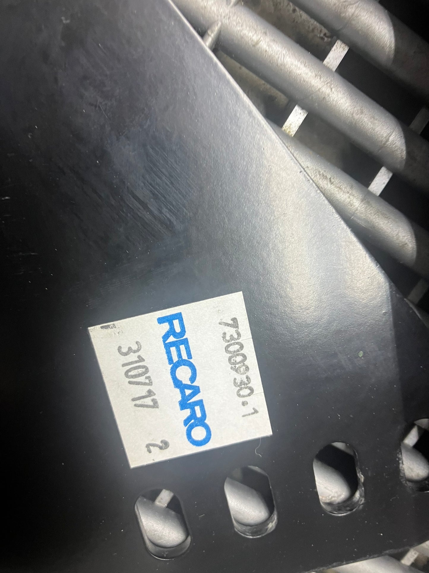 Used. Recaro seat side mounts.