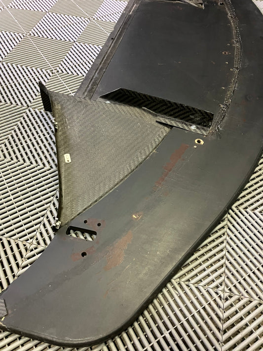 Used. Front splitter (wooden) + air tunnels dry carbon 64x200 cm