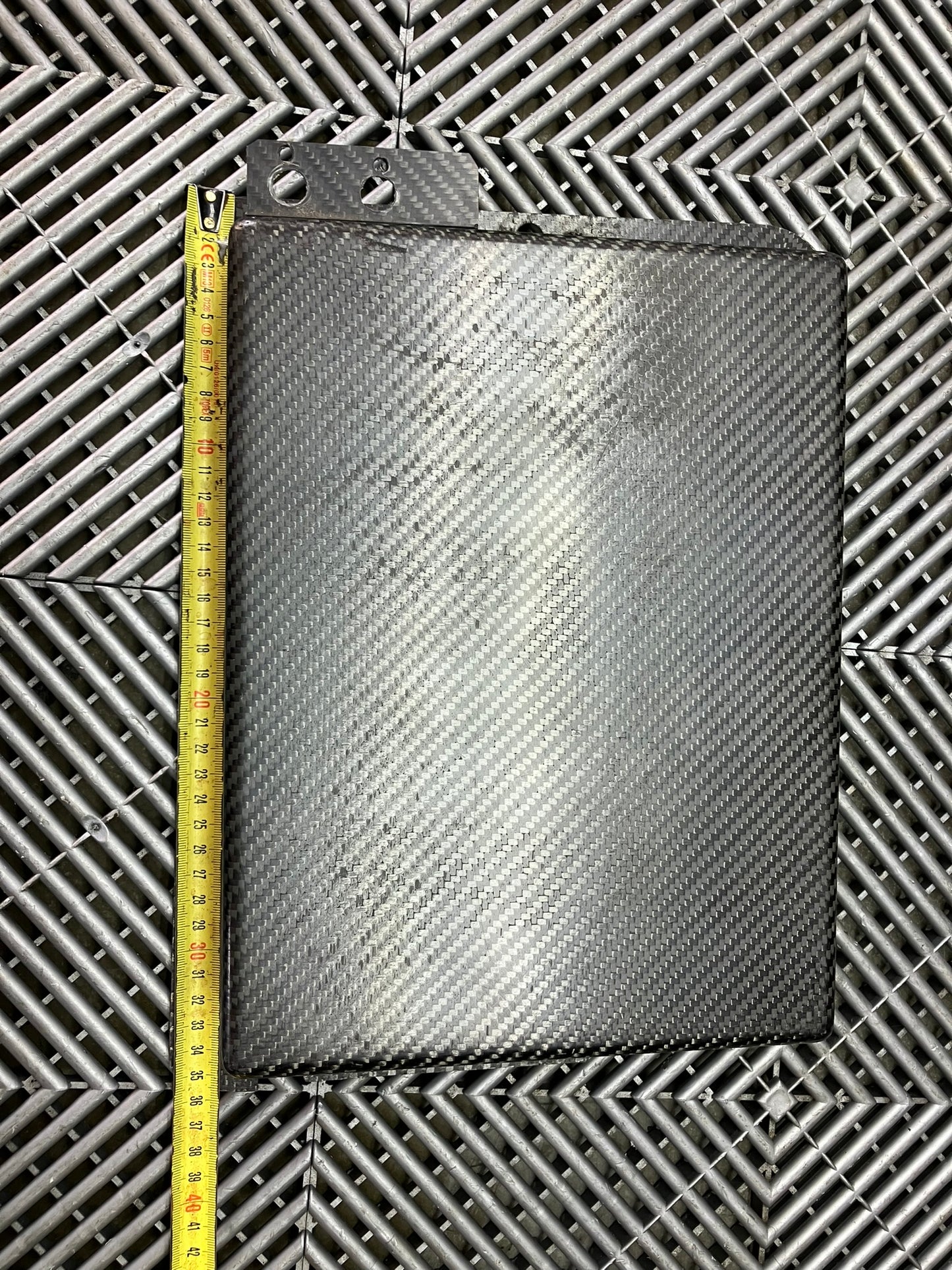 Used. Carbon fiber cover. 35x27 cm