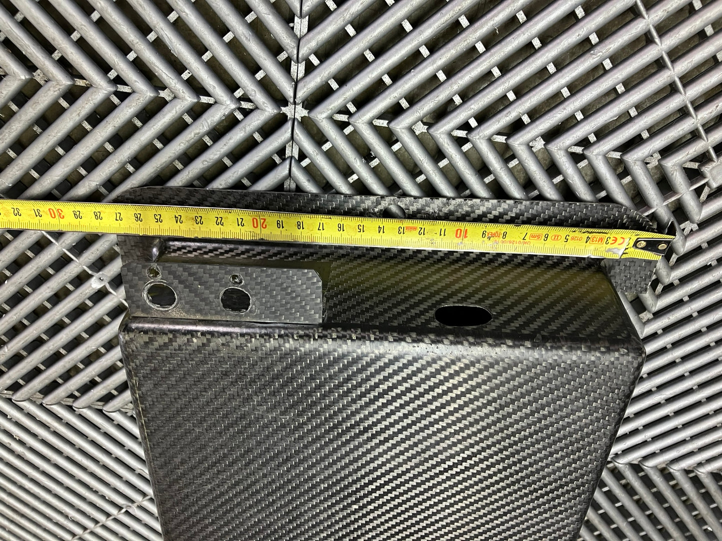 Used. Carbon fiber cover. 35x27 cm