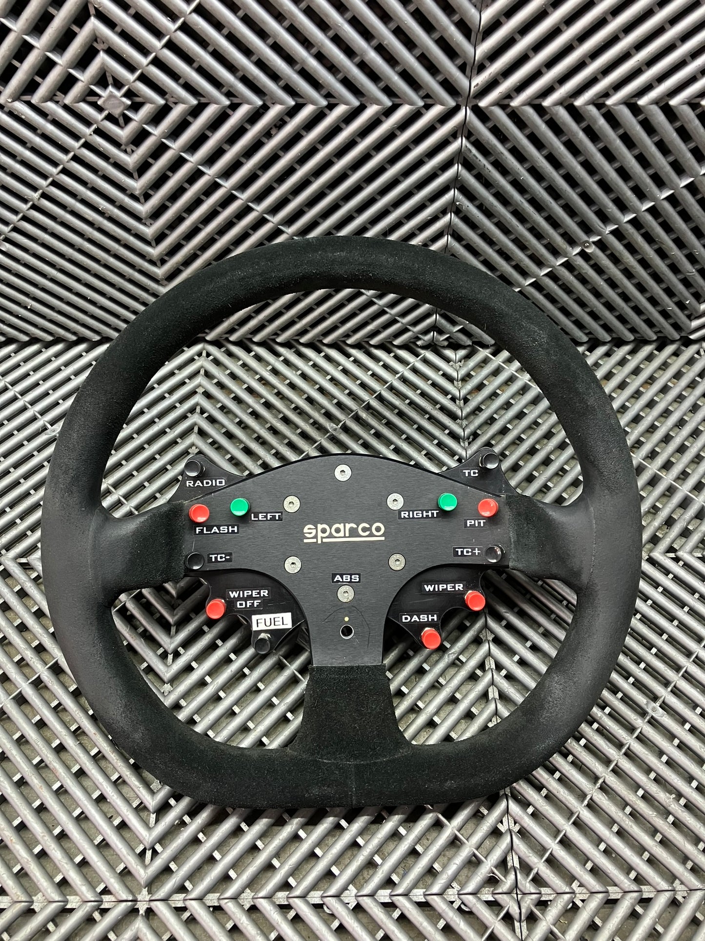 Used. Sparco steering wheel with adapter + wiring + buttons
