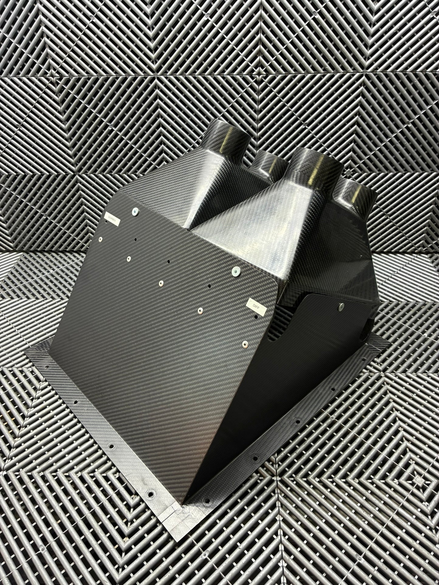 Used. BMW E92 Carbon fiber rear diff and brake cooling vents box.