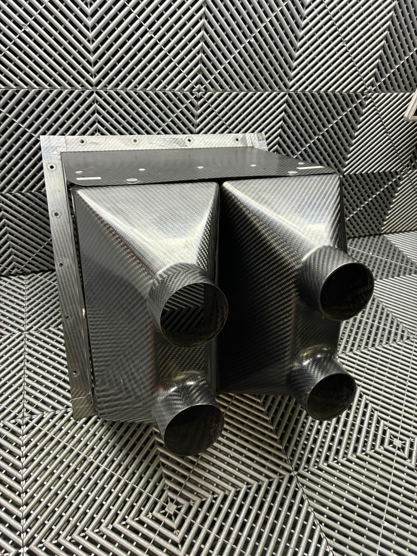 Used. BMW E92 Carbon fiber rear diff and brake cooling vents box.