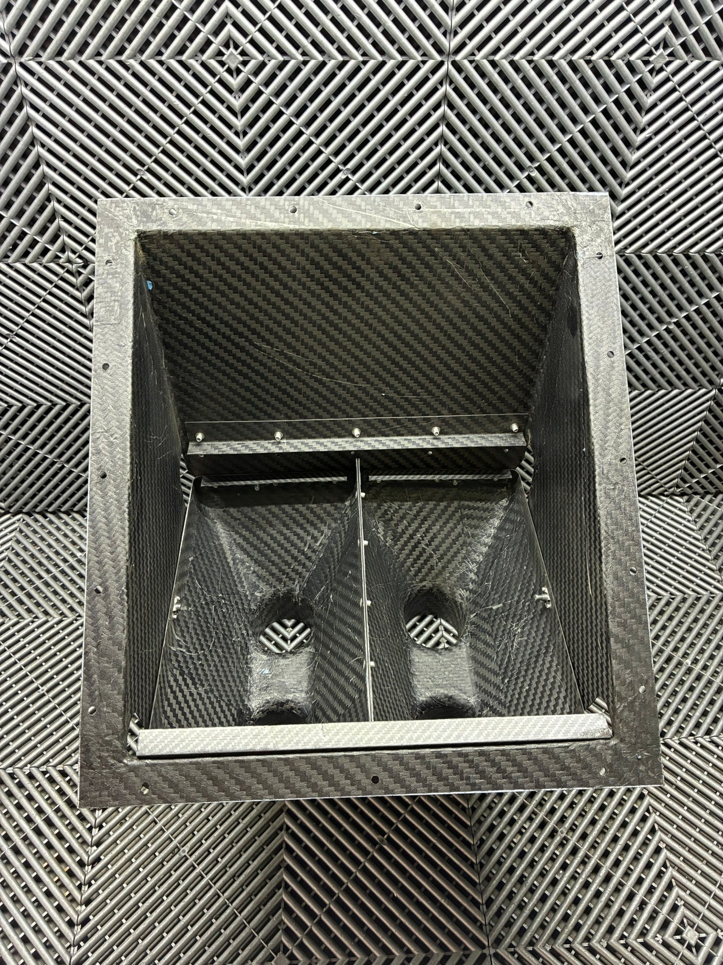 Used. BMW E92 Carbon fiber rear diff and brake cooling vents box.