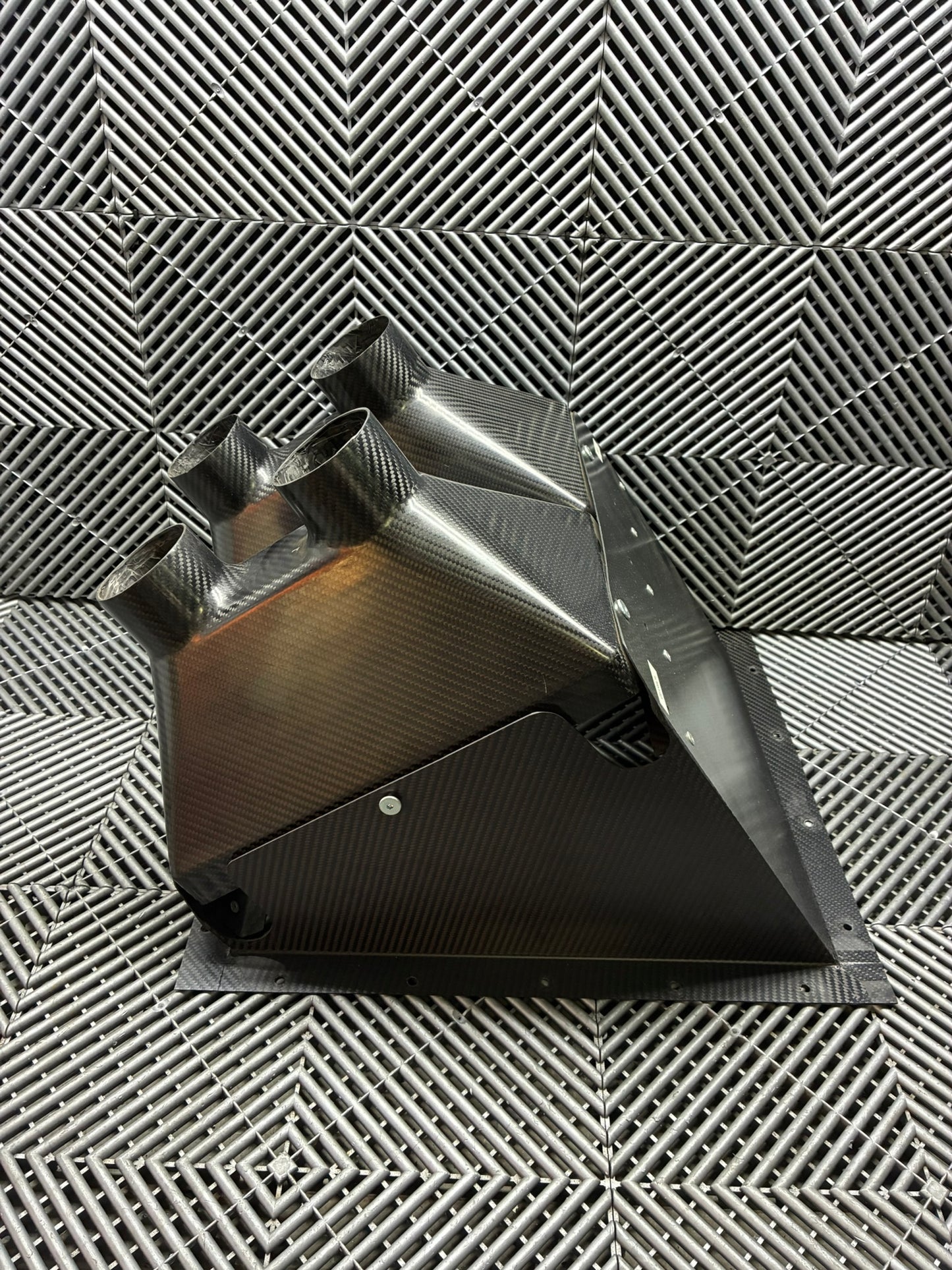 Used. BMW E92 Carbon fiber rear diff and brake cooling vents box.