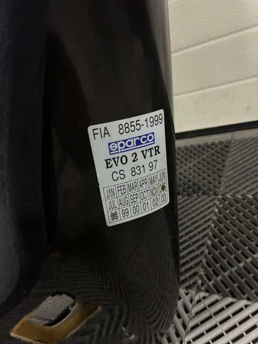 Used. Sparco EVO2 seat.