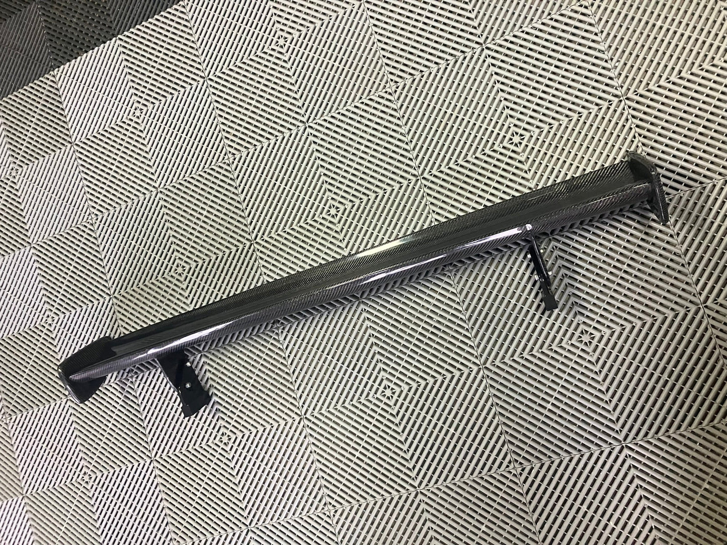Used. BMW GT4 style rear spoiler. Carbon fiber.