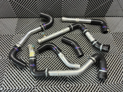 Used. GT3 style angle radiator hosing. Bmw