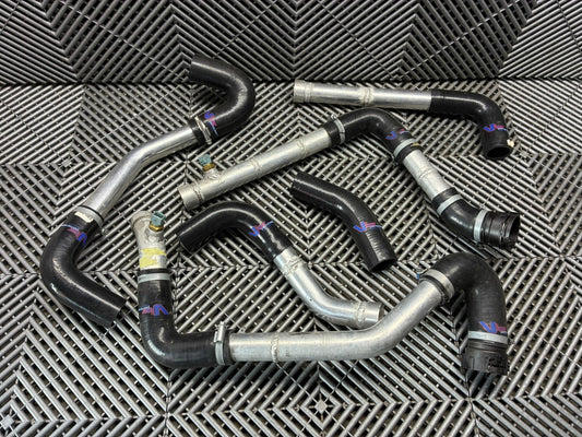 Used. GT3 style angle radiator hosing. Bmw