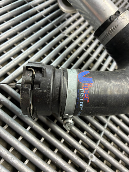 Used. GT3 style angle radiator hosing. Bmw