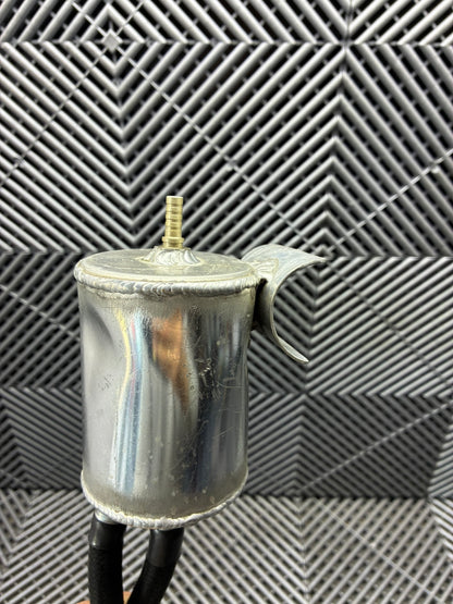 Used. Oil catch can.