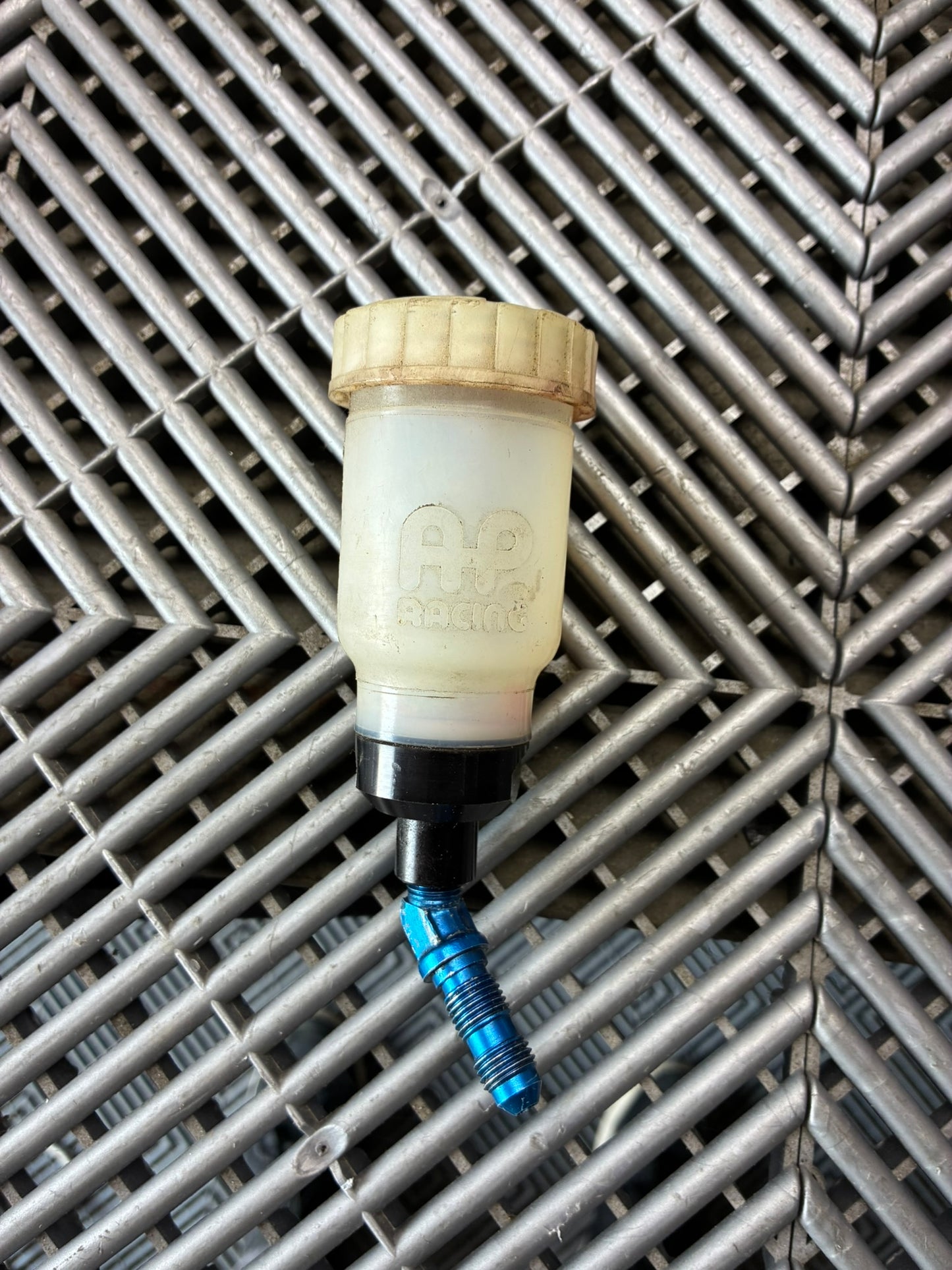 Used. AP racing AP4709 brake reservoir with adapter.