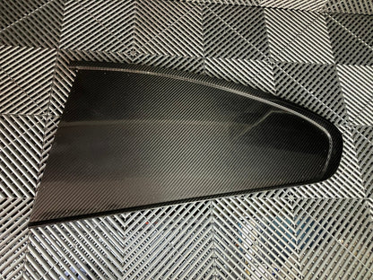 Used. Rear left side dry carbon window cover for Bmw E92.