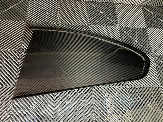 Used. Rear left side dry carbon window cover for Bmw E92.