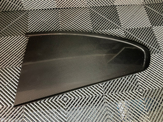 Used. Rear left side dry carbon window cover for Bmw E92.