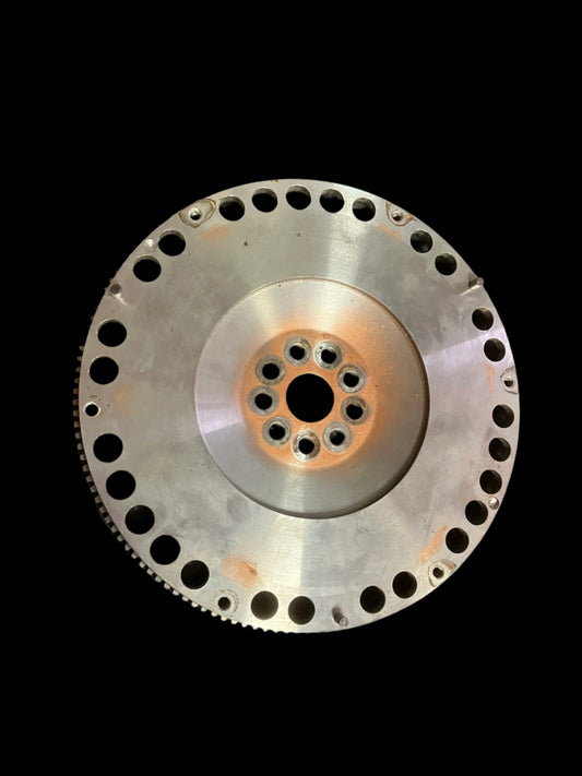 Used. Ford Cosworth lightweight flywheel.