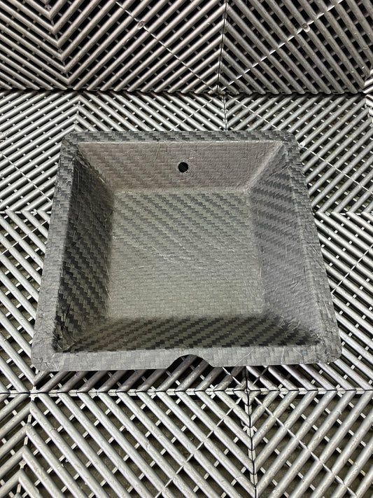New.  Carbon fiber cover. 27x27 cm