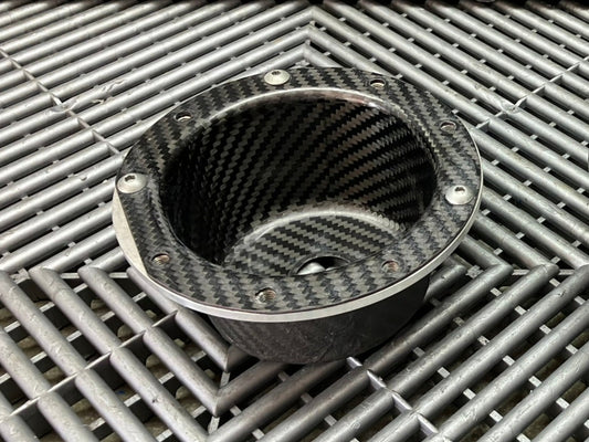Used. Air jack connecting valve mounting bracket. Carbon fiber.