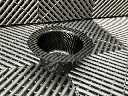 New. Air jack connecting valve mounting bracket. Carbon fiber.