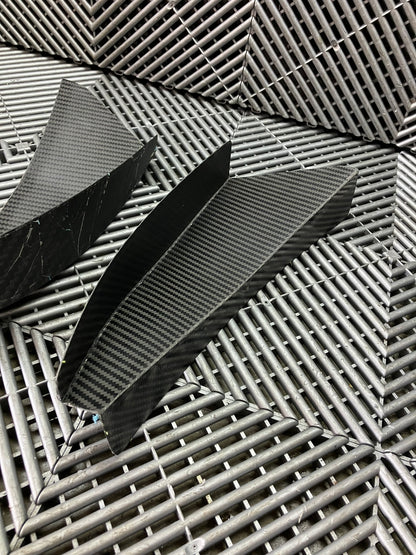 New. Bumper canards. Carbon fiber.