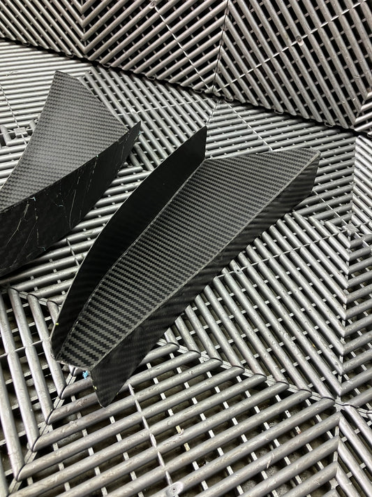 New. Bumper canards. Carbon fiber.