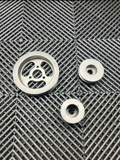 Used. Aliminium pulleys for cosworth engine.