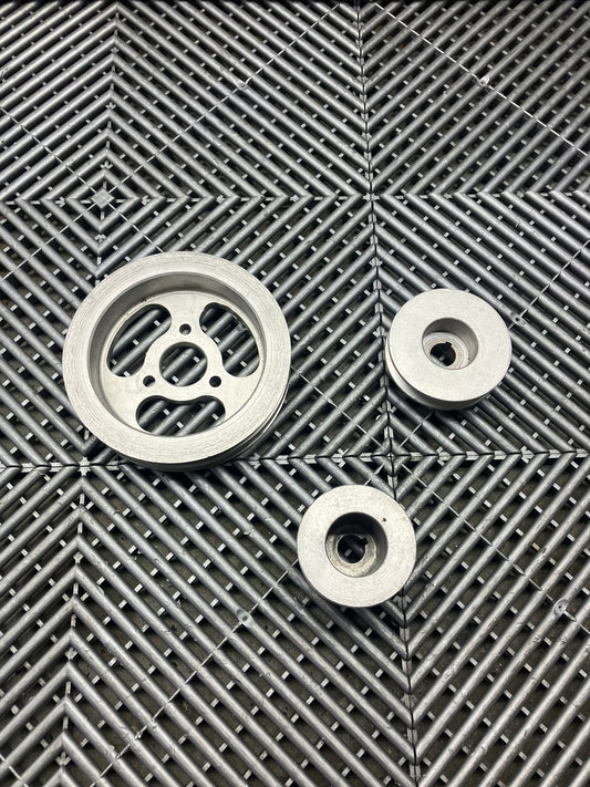 Used. Aliminium pulleys for cosworth engine.