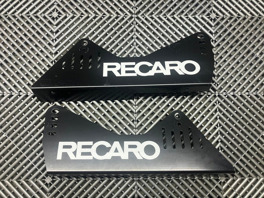 Used. Recaro seat side mounts.