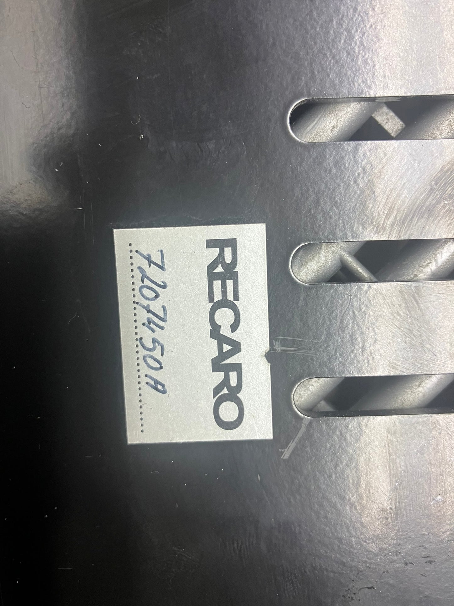Used. Recaro seat side mounts.