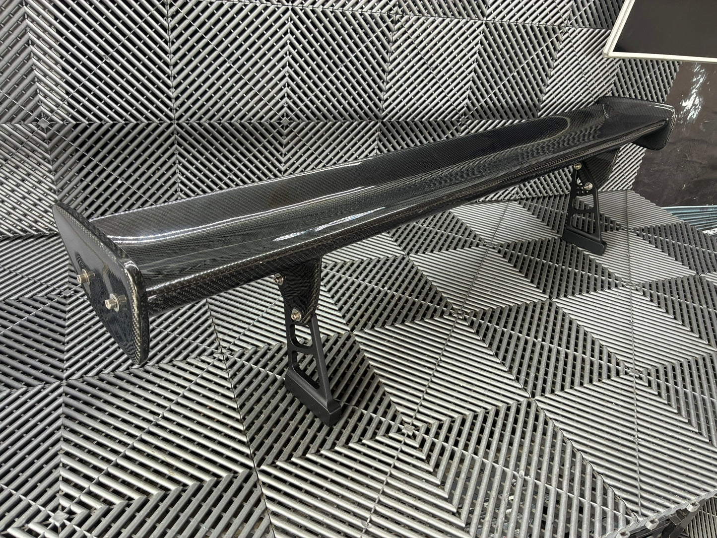 Used. Carbon Gt4 style rear wing. With high risers.