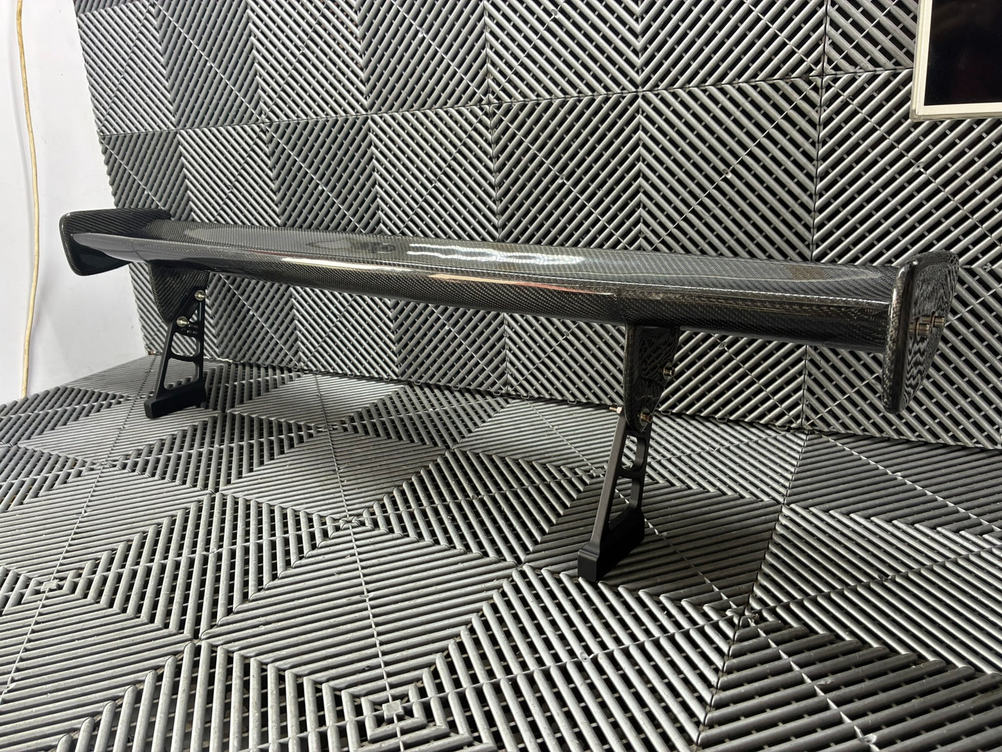 Used. Carbon Gt4 style rear wing. With high risers.