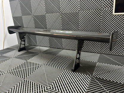 Used. Carbon Gt4 style rear wing. With high risers.
